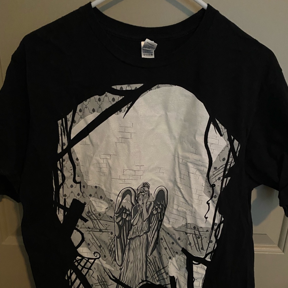 Doctor Who Weeping Angel glow in the dark shirt. WOOT.